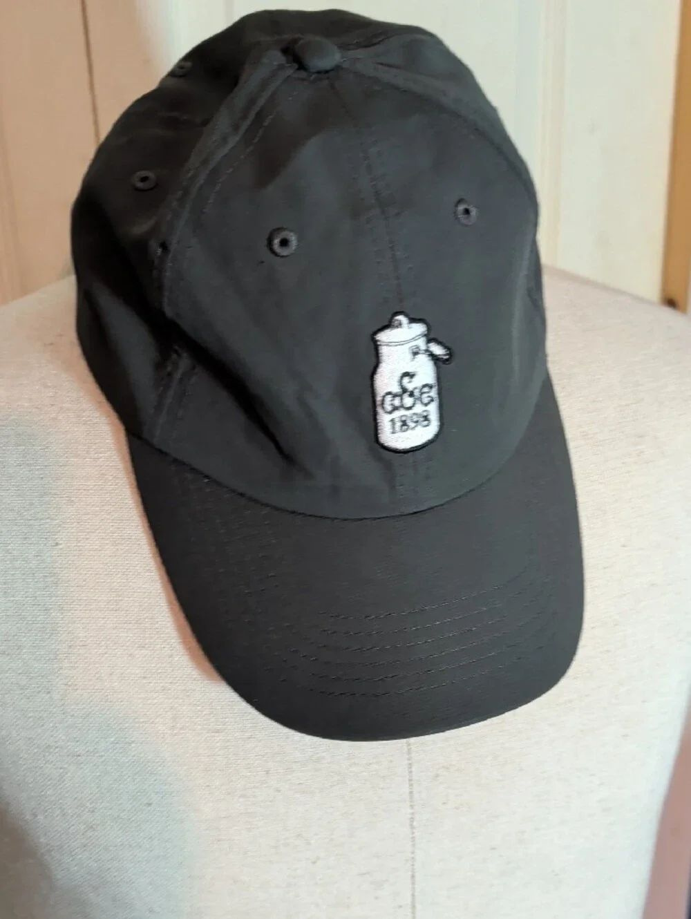 Black Embroidered Can Graphic Baseball Cap
